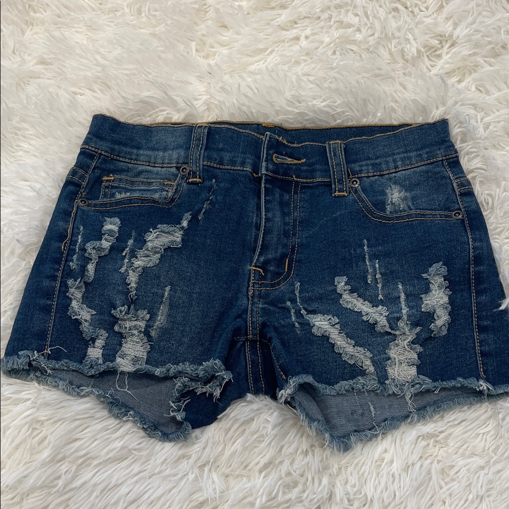 Never worn! Contraband blue denim distressed jean shorts. Size 14 girls.